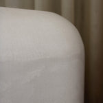 Close-up of Clay Crème showing a subtle, fine grain across its tactile surface and softly rounded edge.