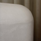 Close-up of Clay Crème showing a subtle, fine grain across its tactile surface and softly rounded edge.