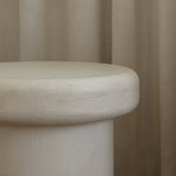 Close-up of Clay Duvet showing a subtle, fine grain across its tactile surface and softly rounded edge.