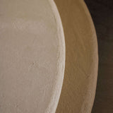 Close-up of Clay Duvet showing a subtle, fine grain across its tactile surface and softly rounded edge.