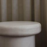 Close-up of Clay Duvet showing a subtle, fine grain across its tactile surface and softly rounded edge.