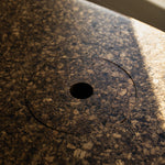 Close-up of Espresso cork showing its tactile, mottled texture and satin finish reflecting natural light.