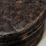 Close-up of Espresso cork showing its tactile, mottled texture and satin finish reflecting natural light.