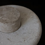 Close-up of the honed Limestone Portland Side Table top, with fossil-like inclusions and subtle grey-beige tonal variation.