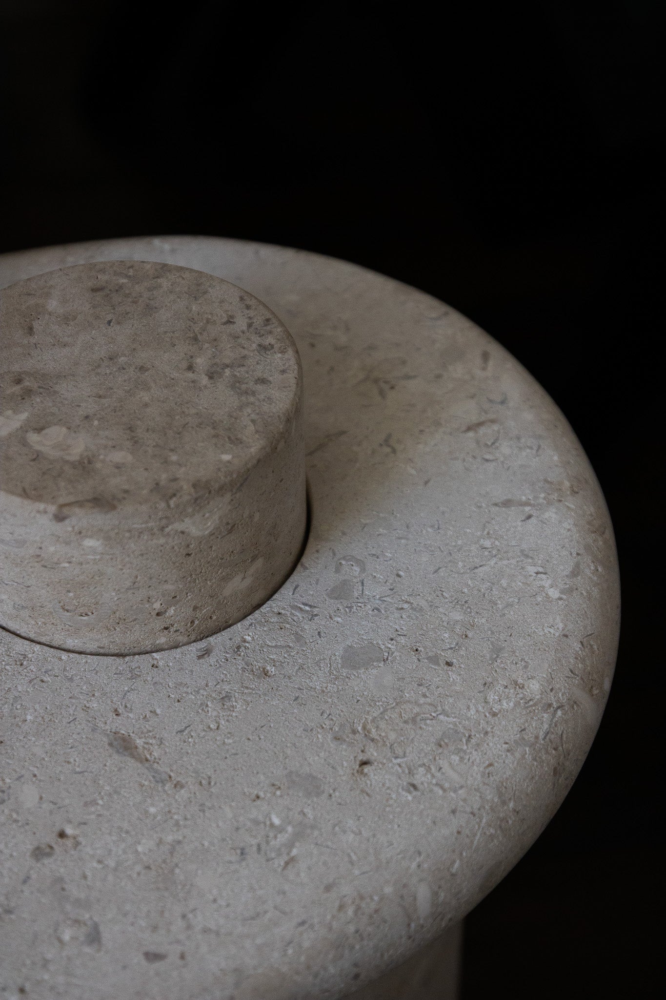 Close-up of the honed Limestone Portland Side Table top, with fossil-like inclusions and subtle grey-beige tonal variation.