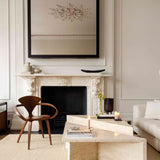 Angular Travertino Classico CC marble coffee tables with warm-toned veining in a natural soft interior.