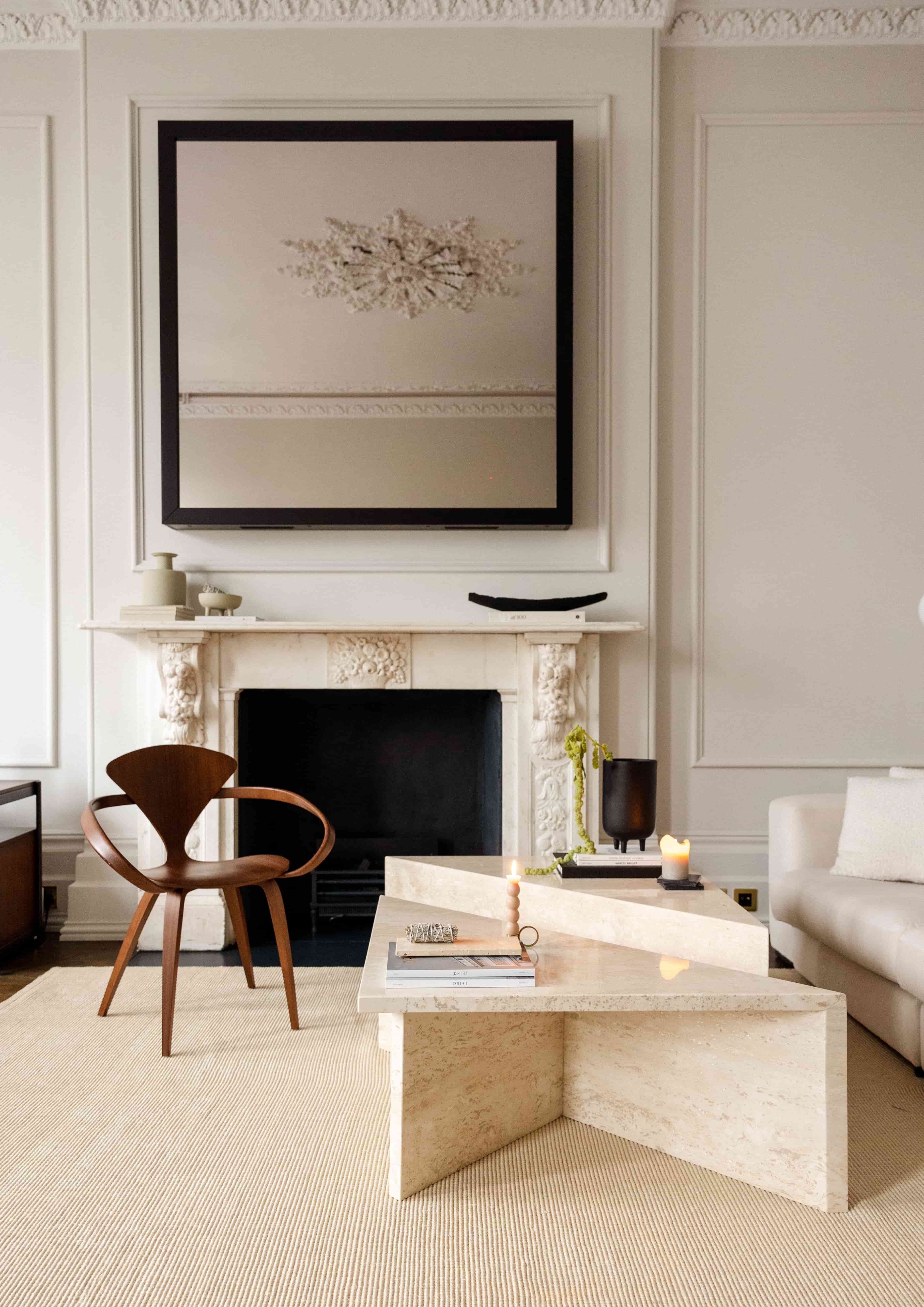Angular Travertino Classico CC marble coffee tables with warm-toned veining in a natural soft interior.