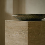 Close-up of Travertino Classico VC showing soft beige veining, natural pores and tonal variation.