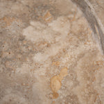 Close-up of Travertino Classico CC showing soft beige veining, natural pores and tonal variation.