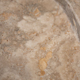 Close-up of Travertino Classico CC showing soft beige veining, natural pores and tonal variation.