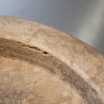 Close-up of Travertino Classico CC showing soft beige veining, natural pores and tonal variation.