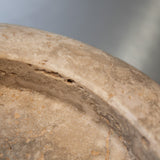 Close-up of Travertino Classico CC showing soft beige veining, natural pores and tonal variation.