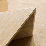 Close-up of Travertino Classico CC showing soft beige veining, natural pores and tonal variation.